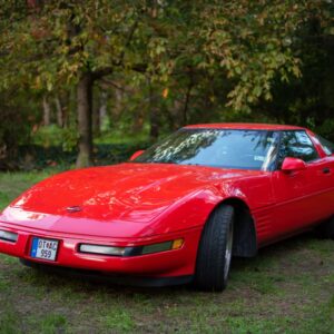 beautiful shot of a red chevy corvette c4