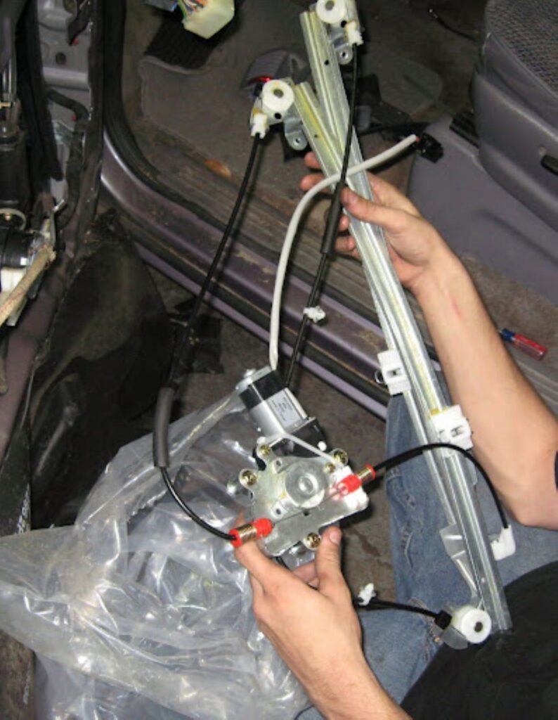 image of a dodge caravan dual track cable window regulator