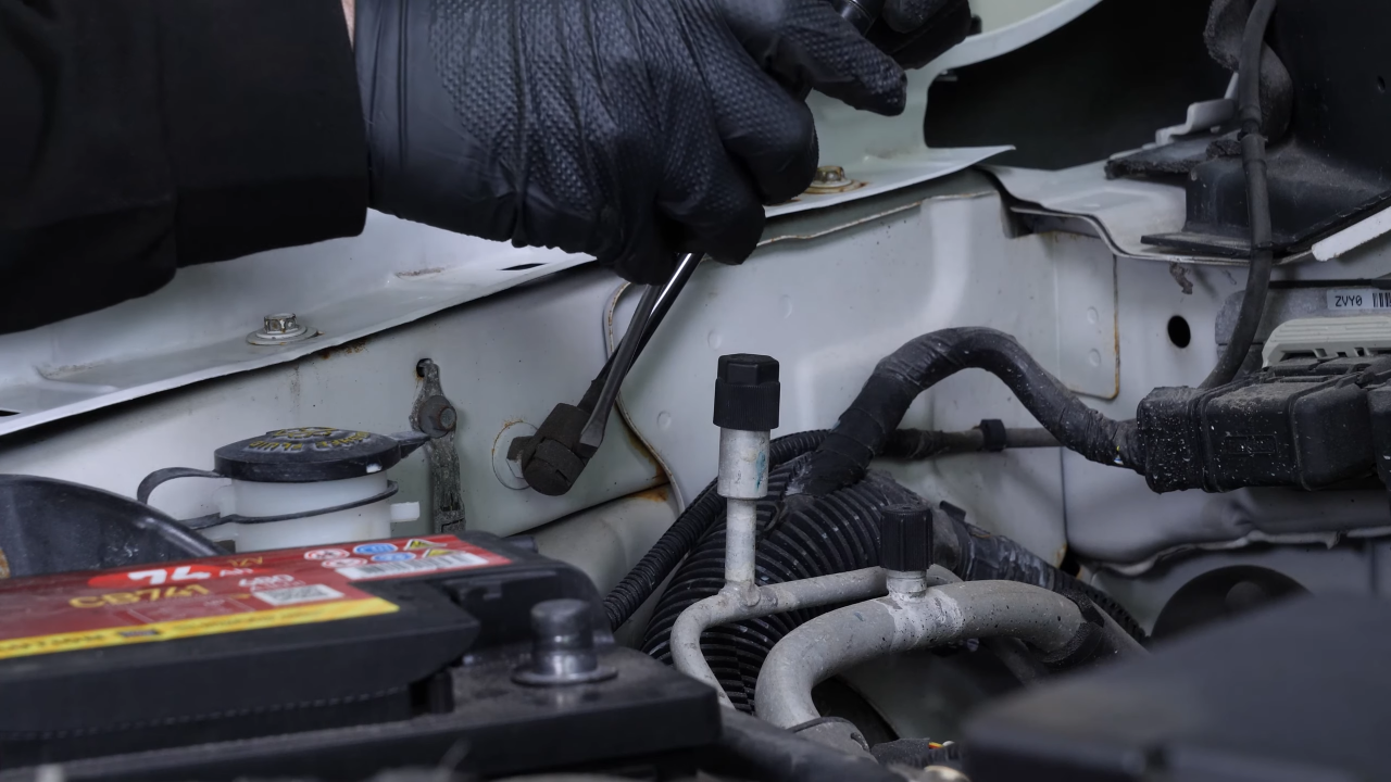 Remove the hood lift support