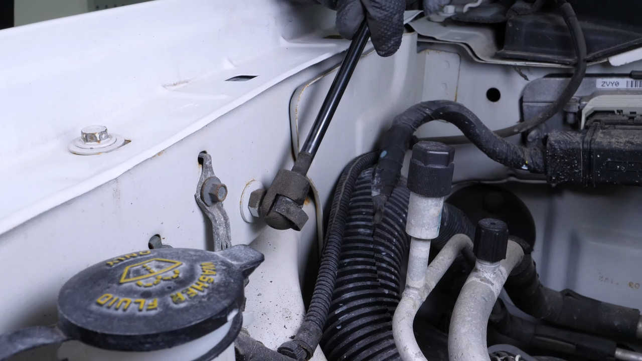 Remove the hood lift support