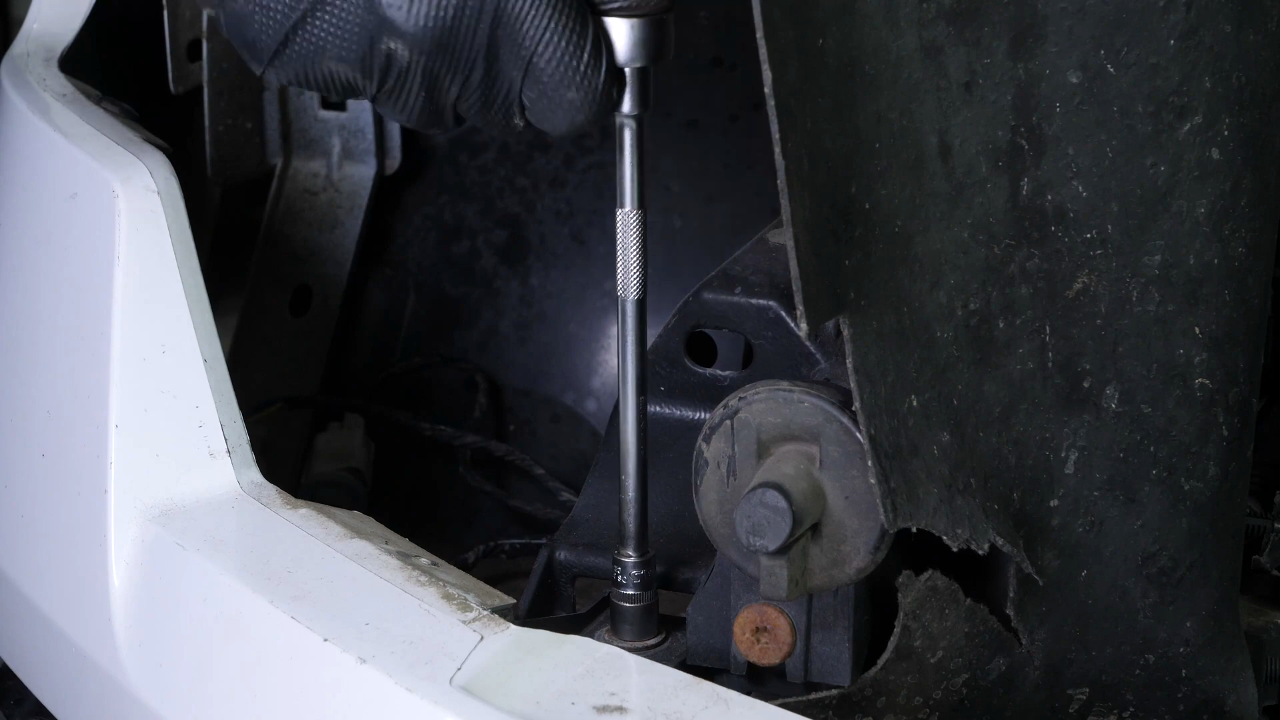 Remove the bumper cover / plastic bracket holding screws