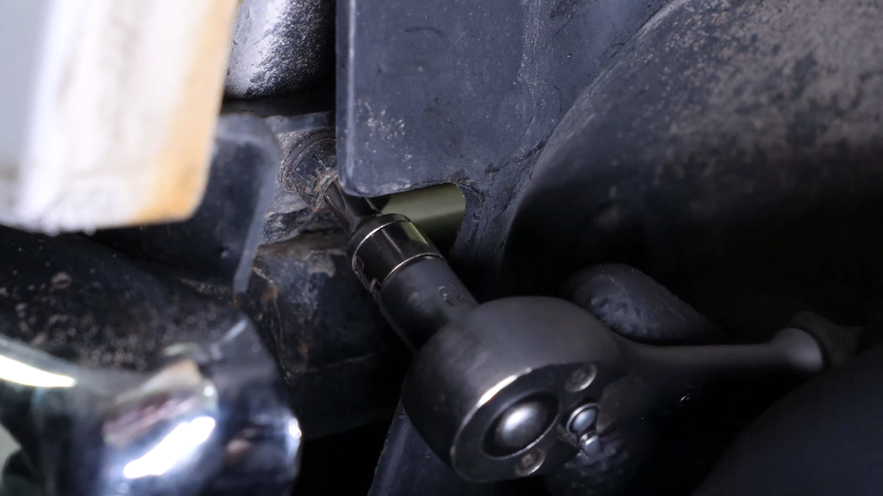 Remove the bumper cover / plastic bracket holding screws