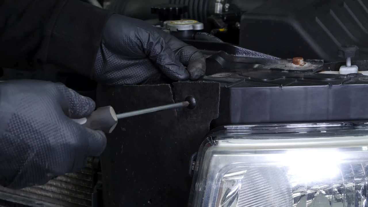Remove the headlight housing