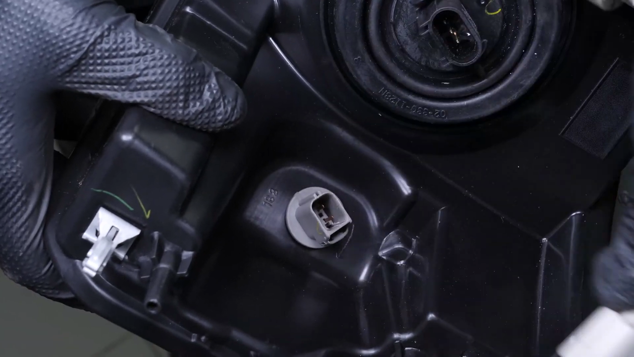 Disconnect the headlight assembly