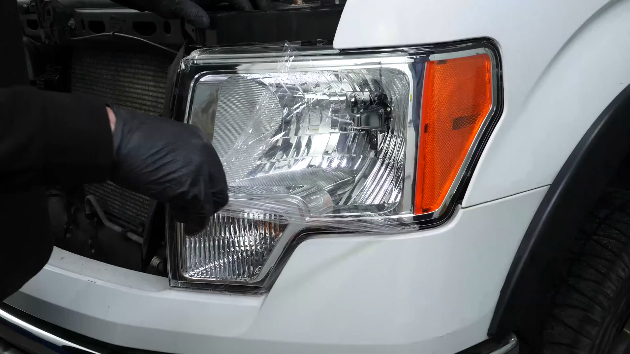 Put the headlight housing back