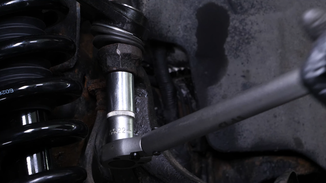 Put the outer tie rod back