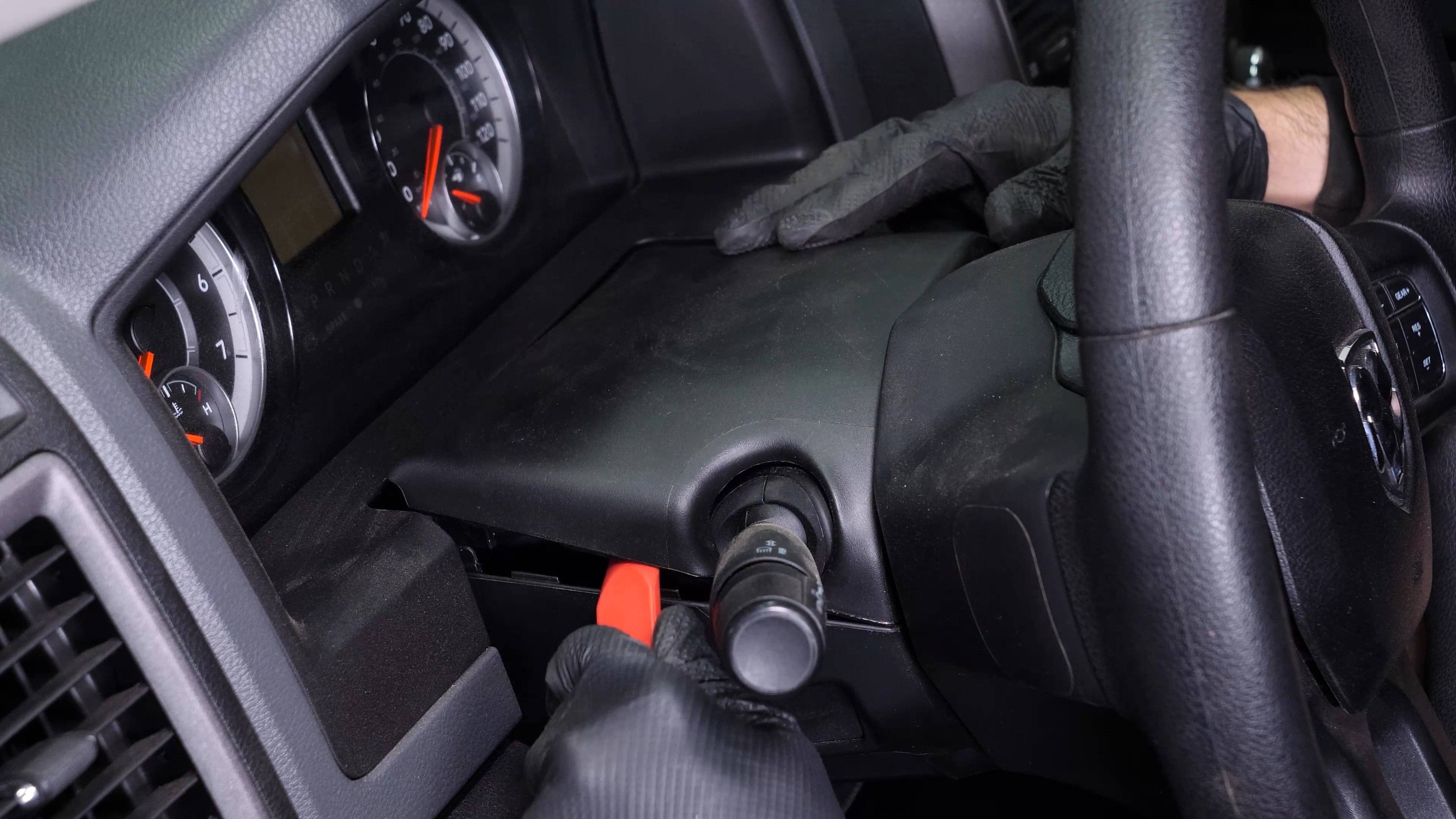 Remove the steering column cover