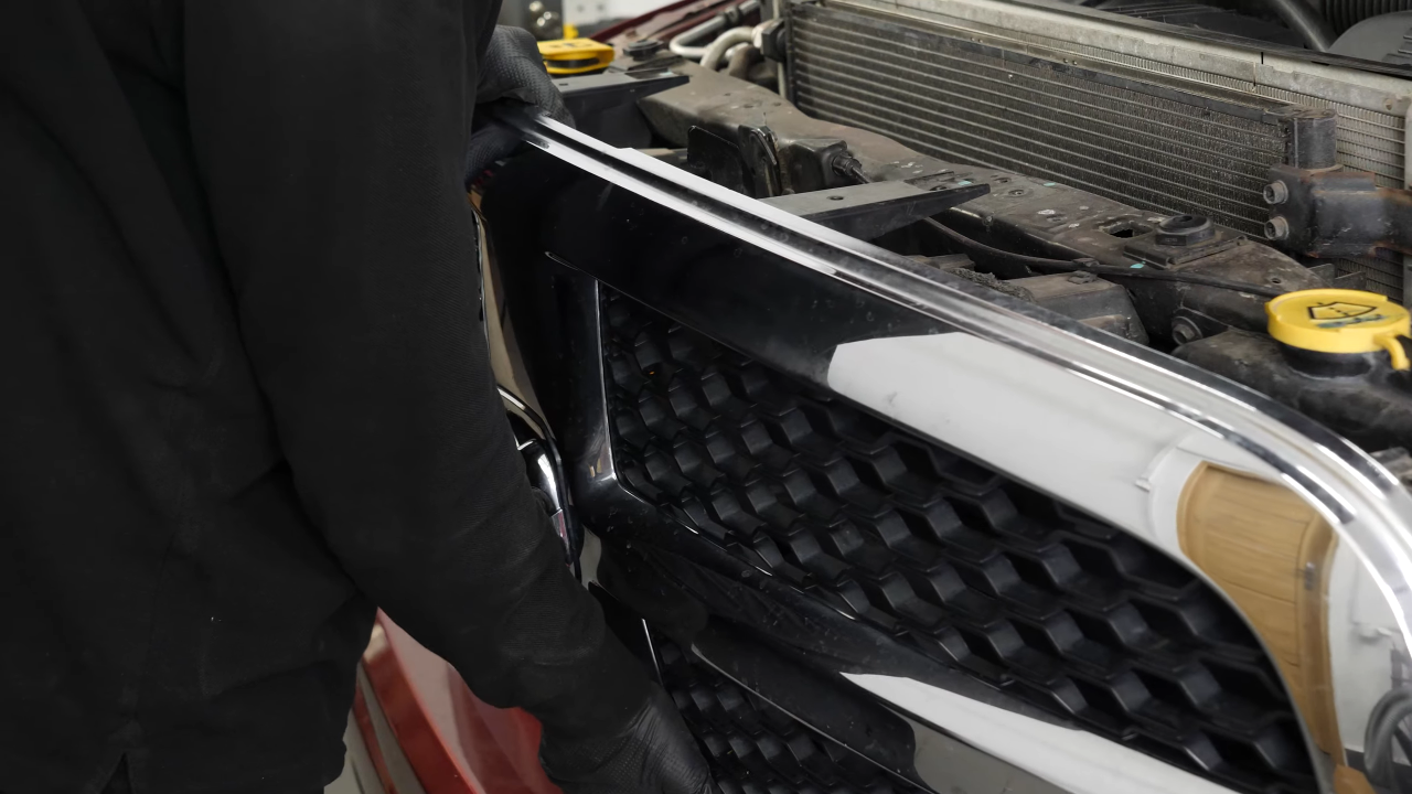 Put the Grille assembly back