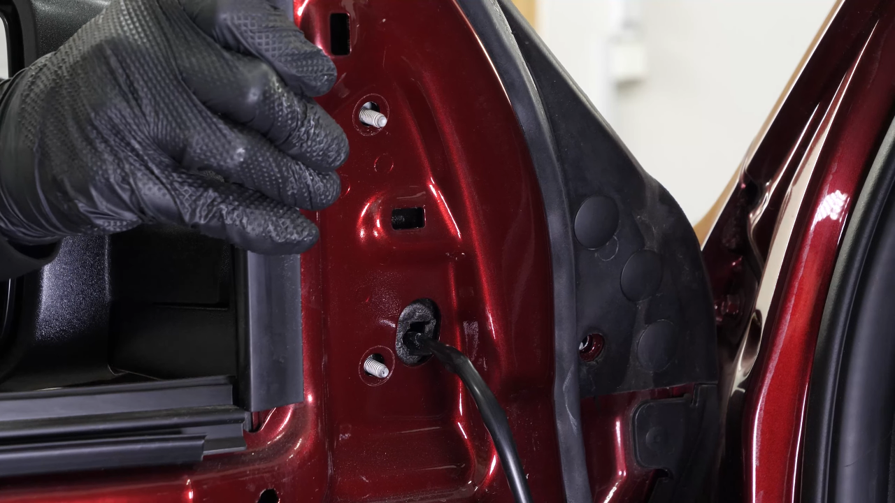 Install the new side view mirror