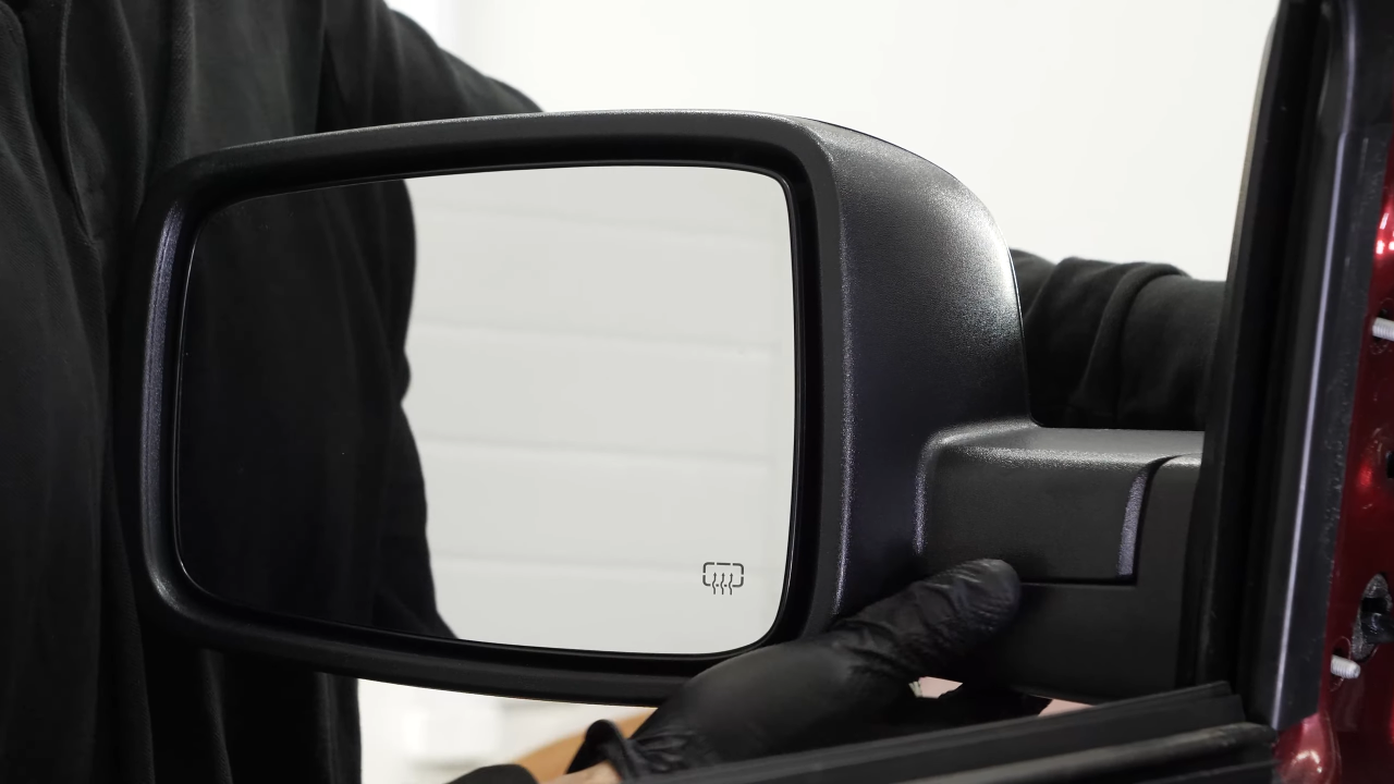 Install the new side view mirror