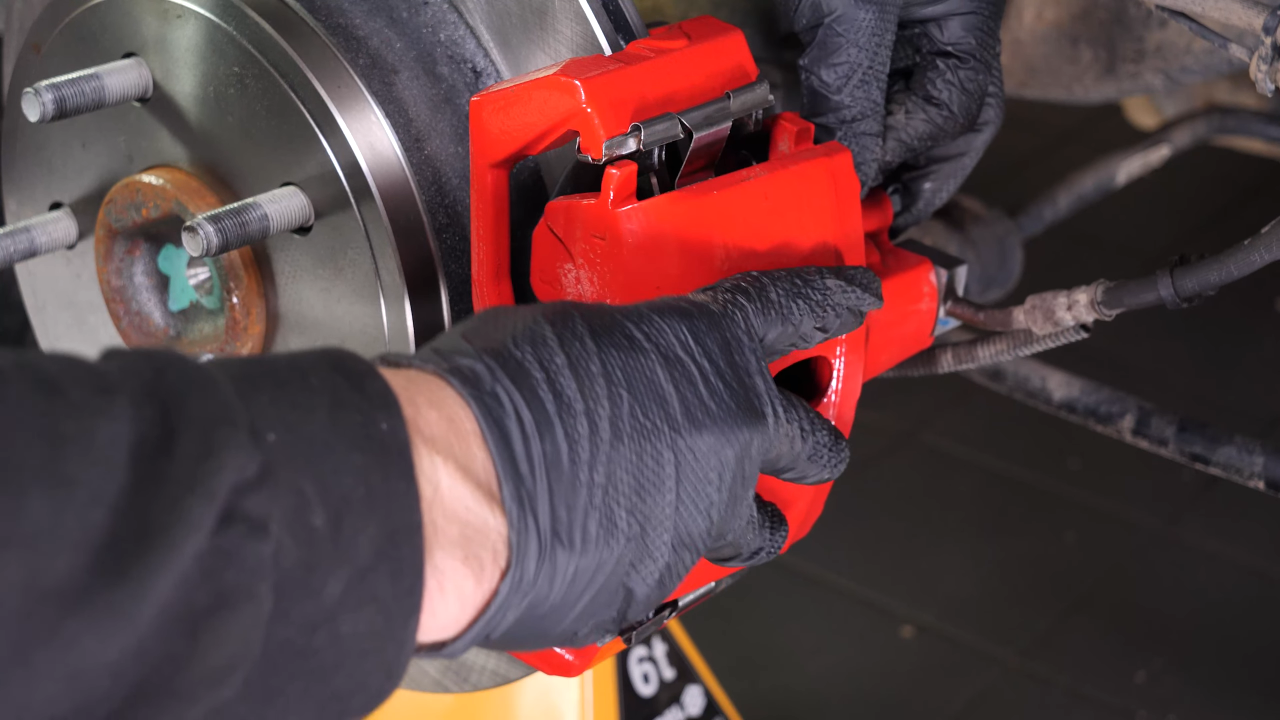 Remove the rear brake system