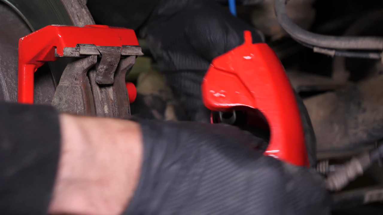 Remove the rear brake system