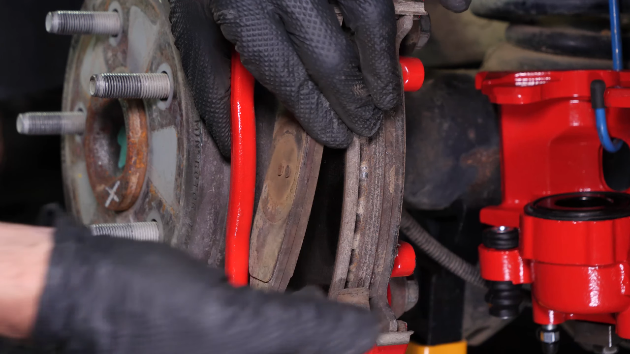 Remove the rear brake system