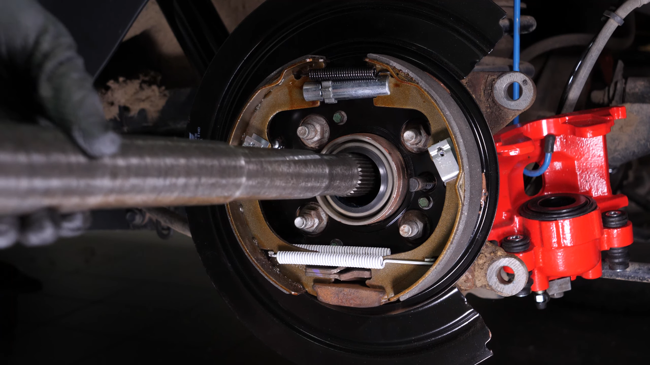 Put the rear axle shaft back