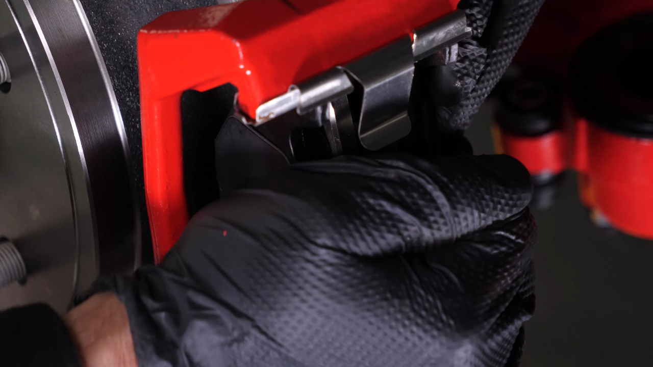 Put the brake pads back