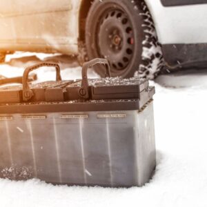 car and battery on a snowy area