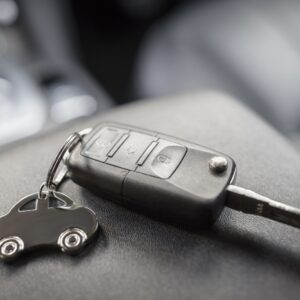 close up shot of a car key fob with keychain