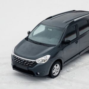 minivan parked on a snowy lot