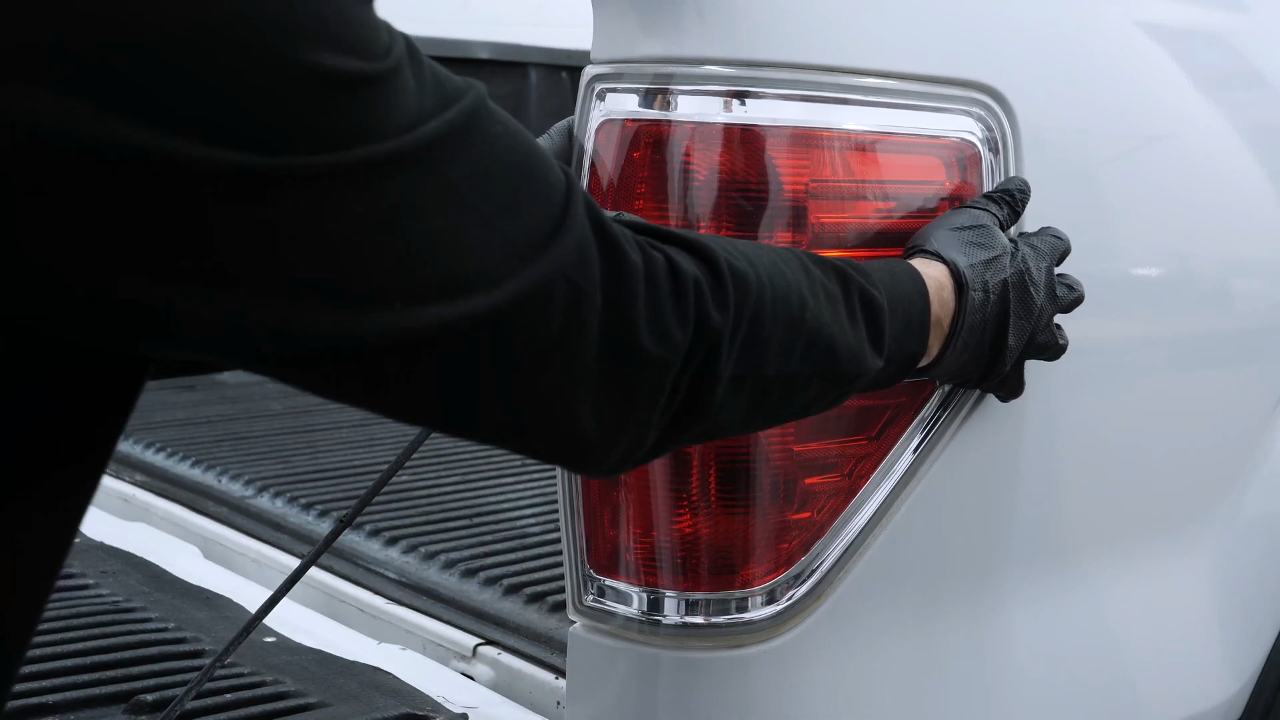 Remove the tail light housing