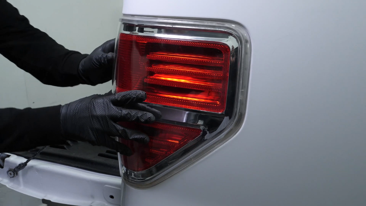 Put the tail light housing back