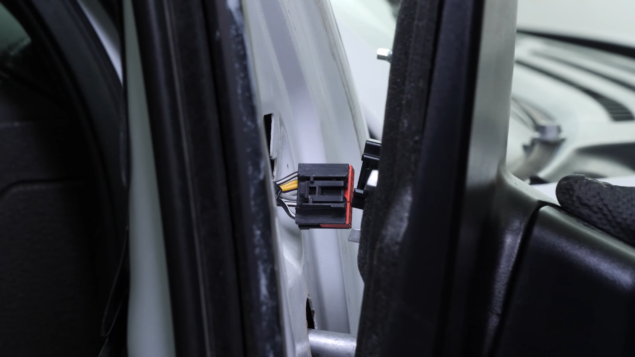 Install the new side view mirror