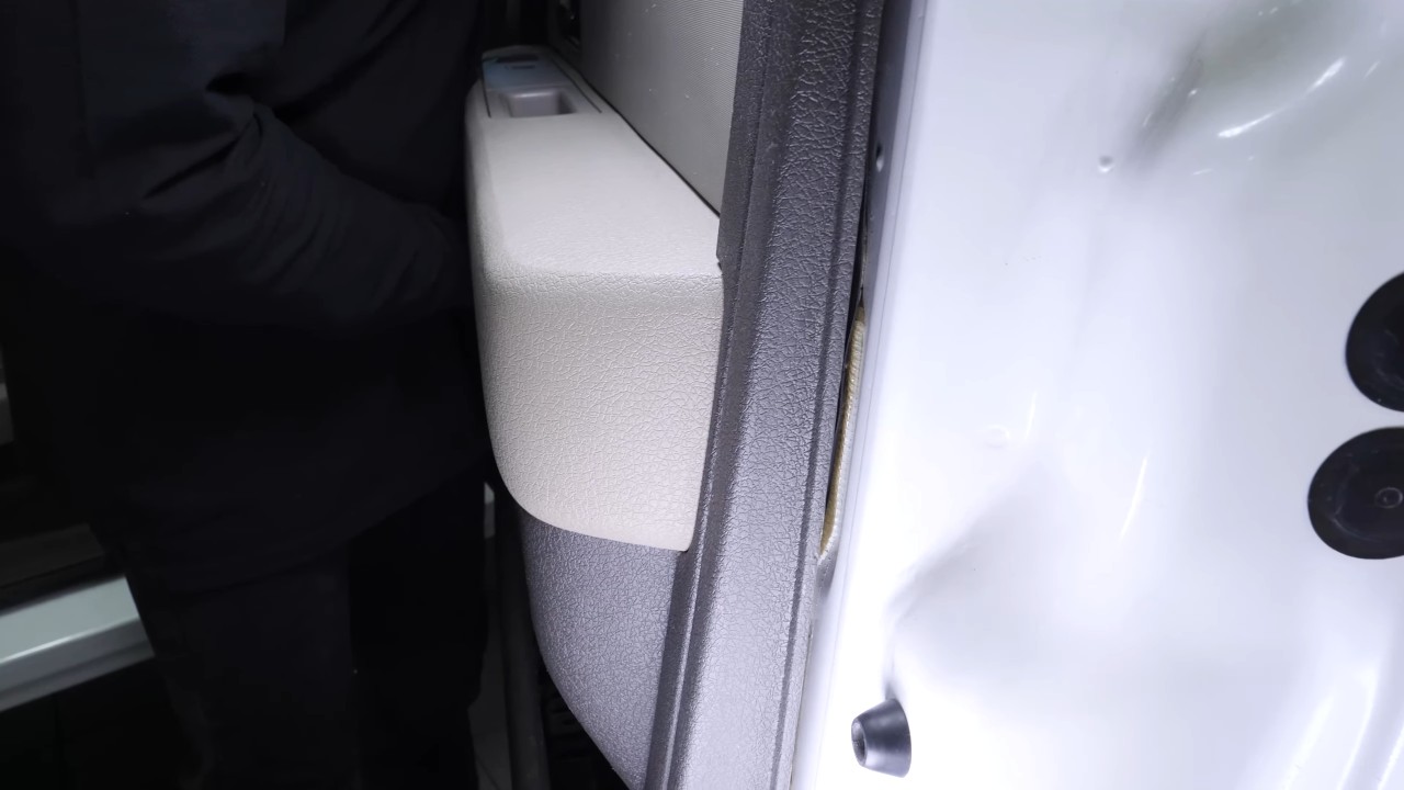 Put the door trim back