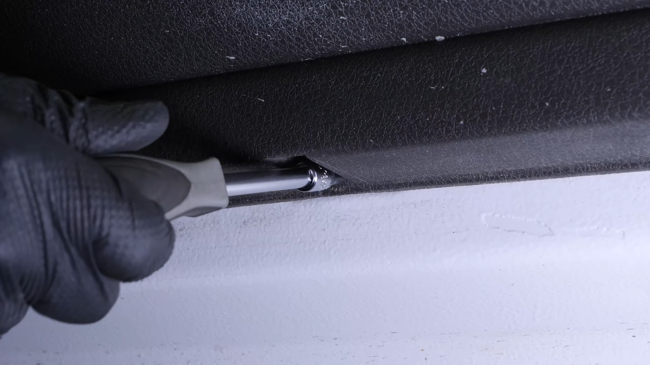 Put the door trim back