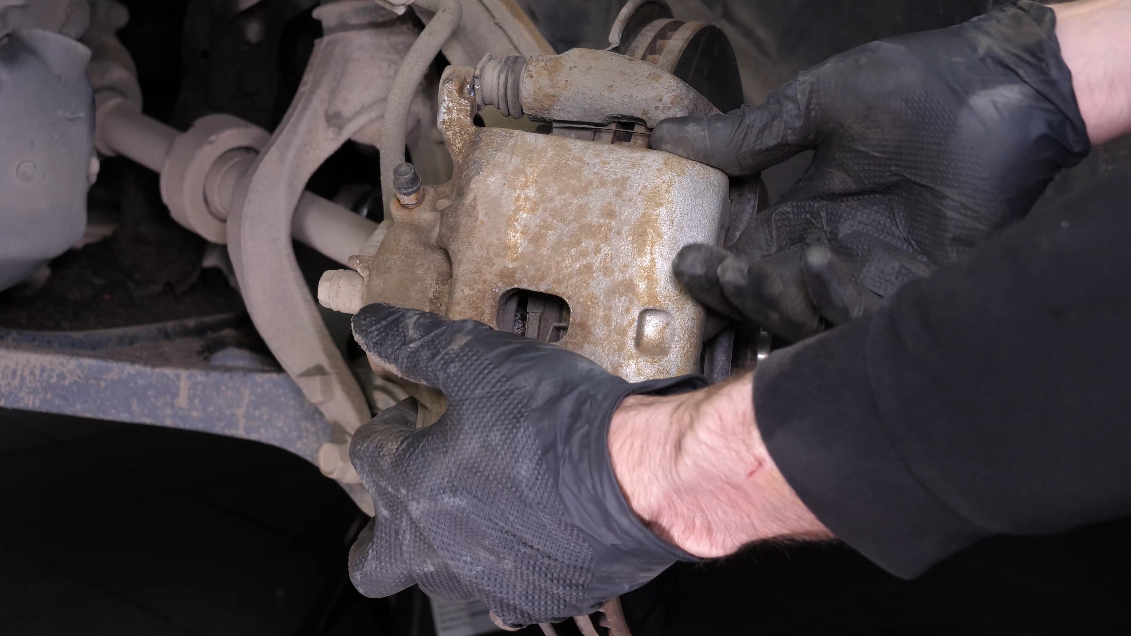 Remove the  brake caliper