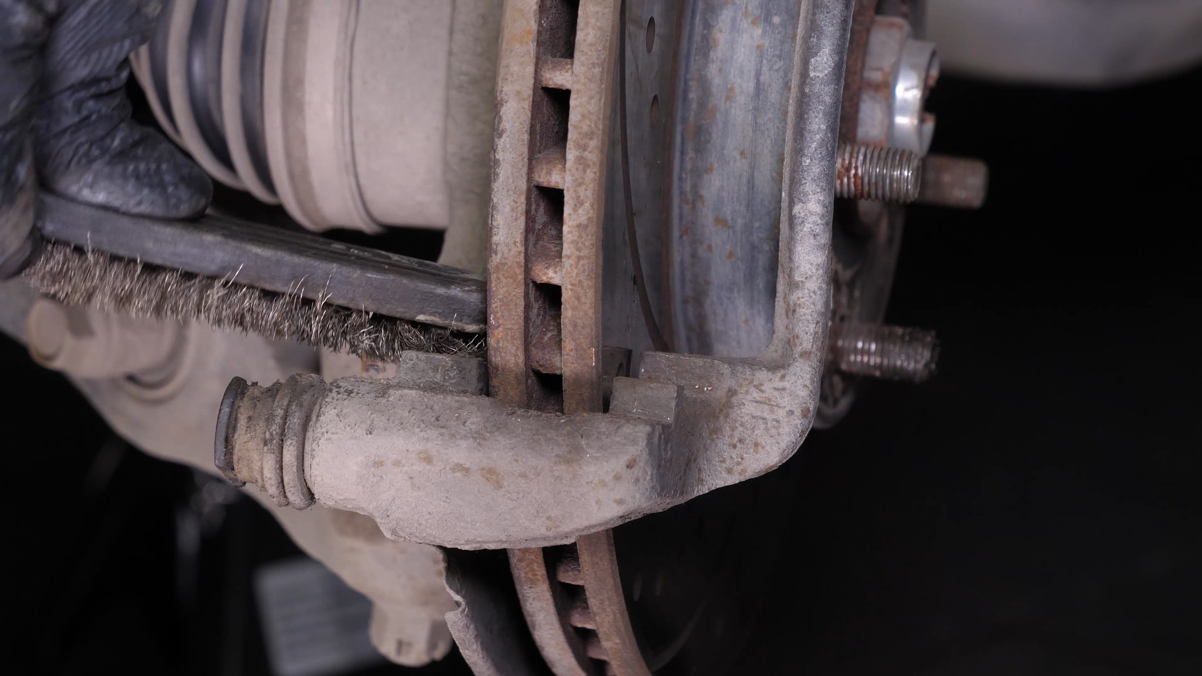 Clean the brake caliper mount