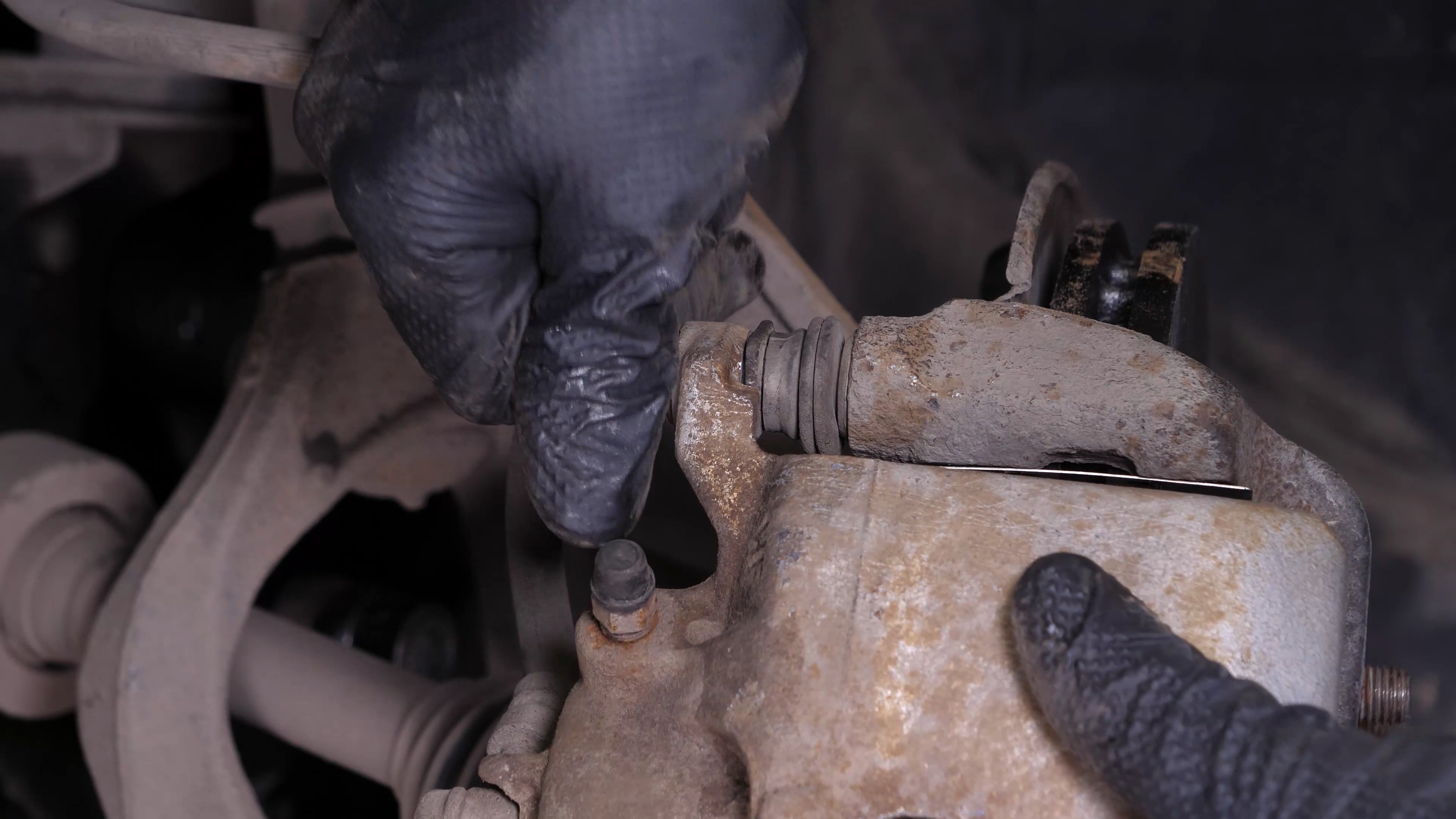 Put the brake caliper back