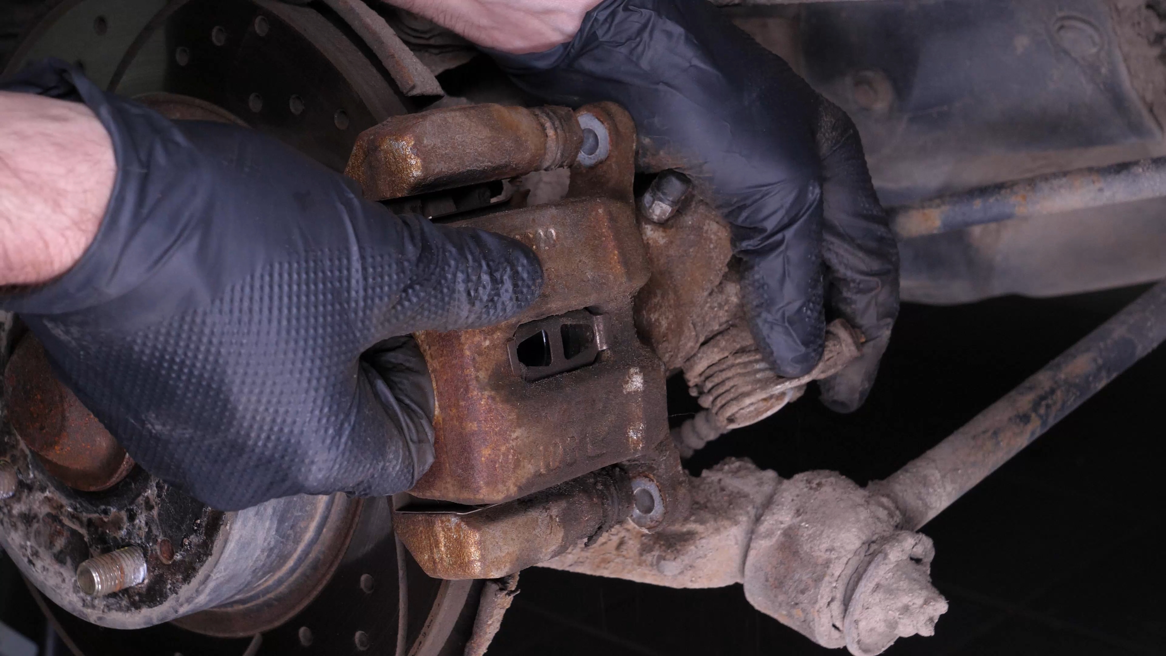 Remove the  brake caliper