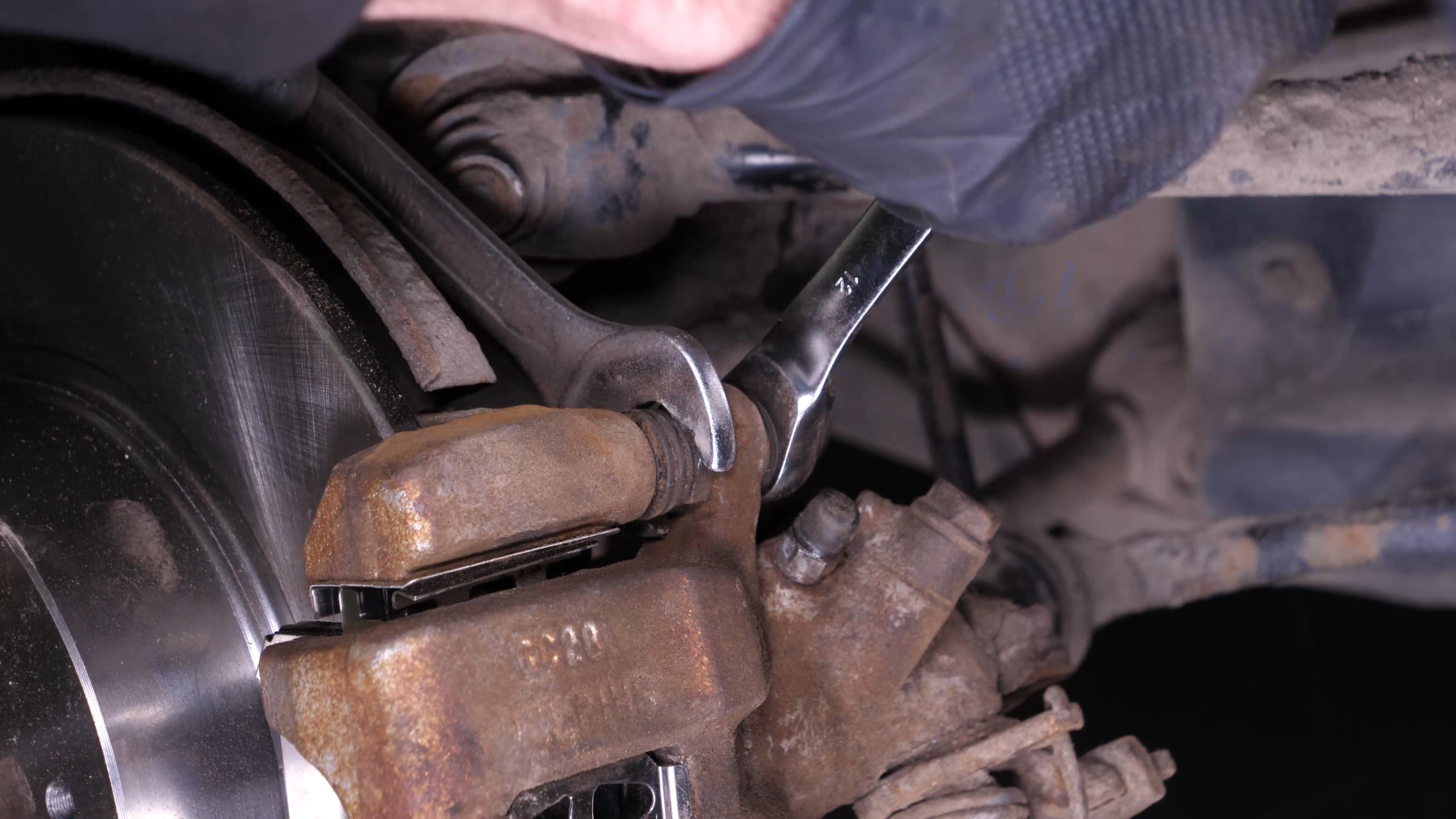 Put the brake caliper back