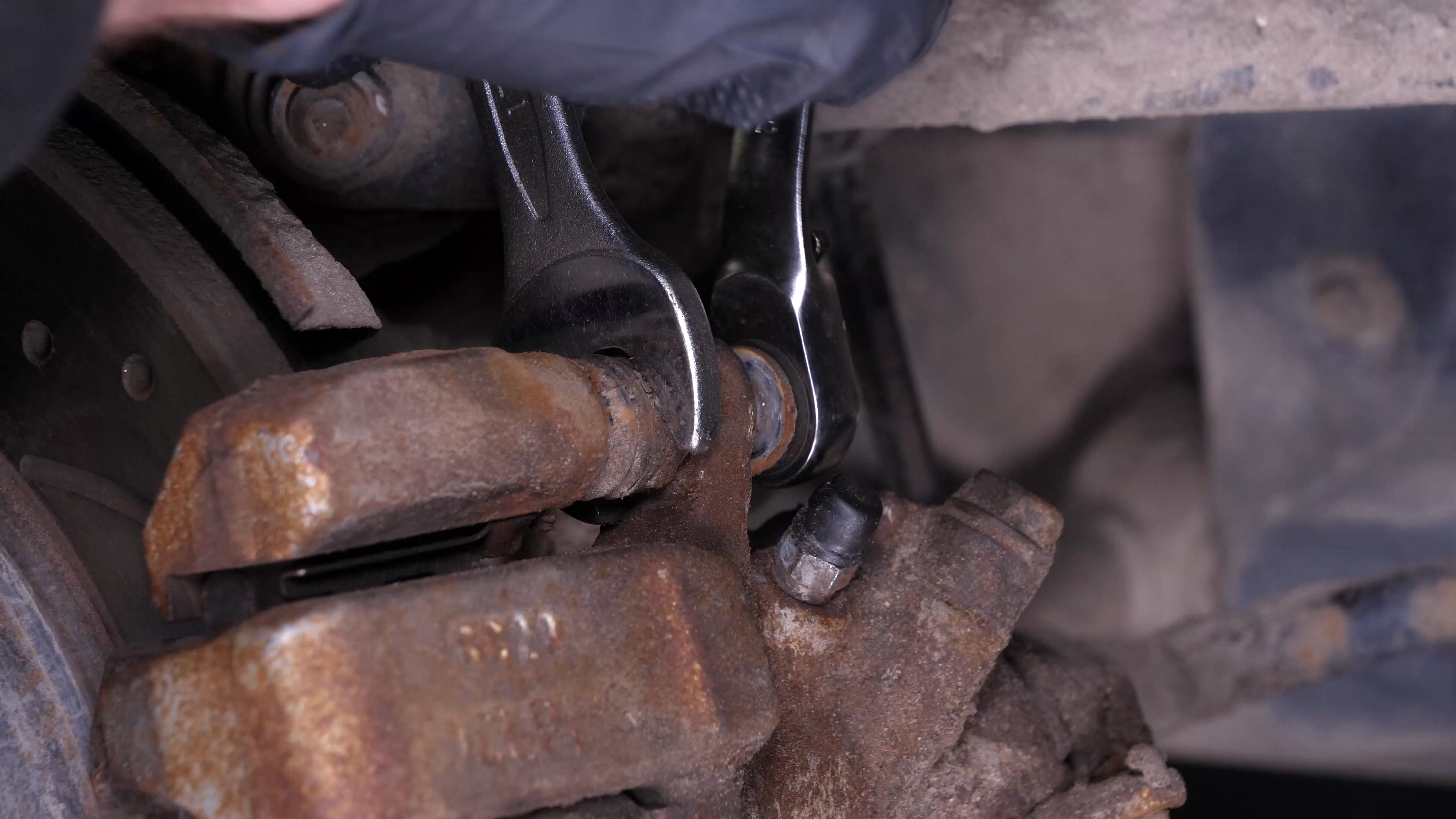 Remove the brake caliper