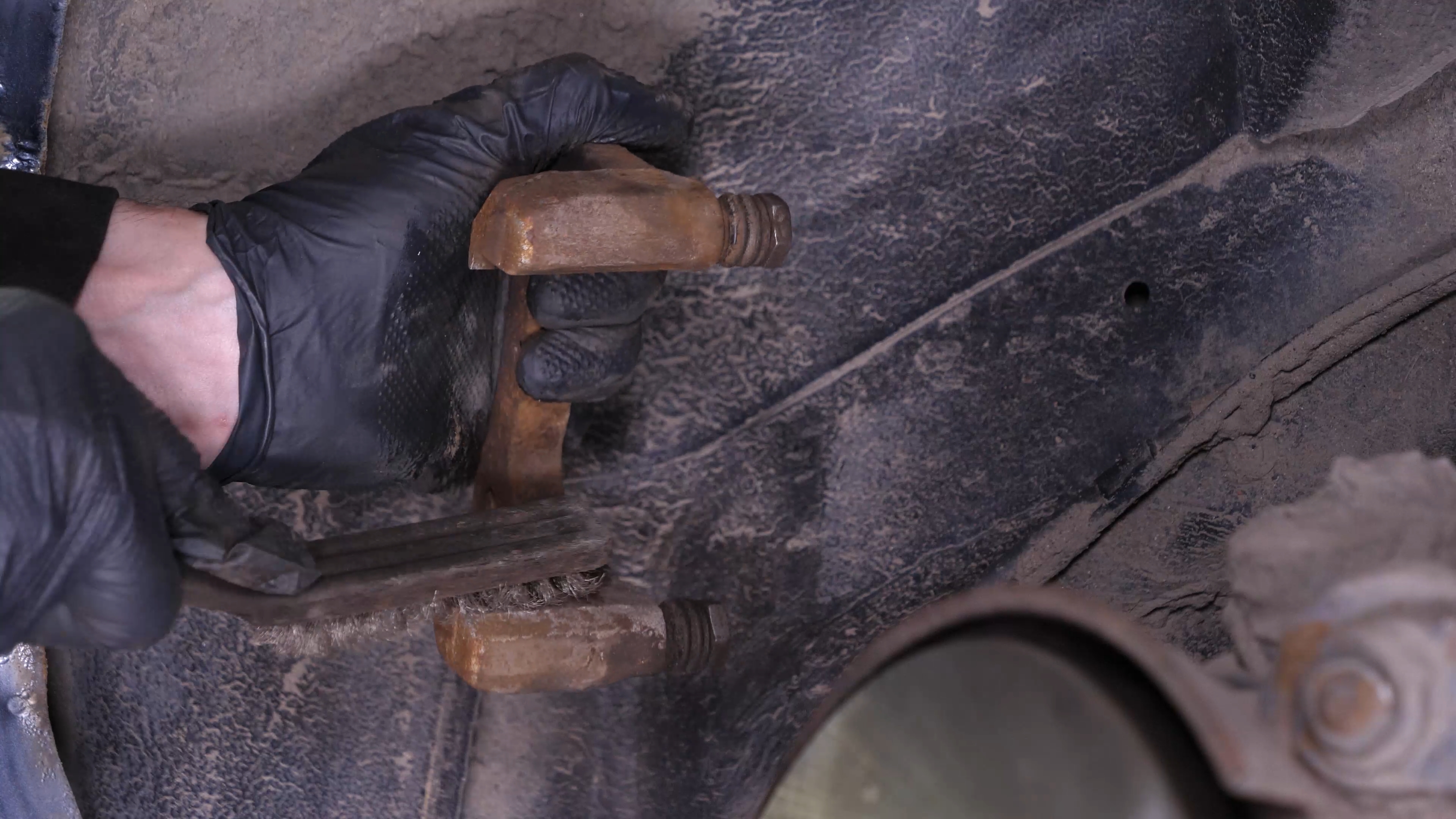 Clean the brake caliper mount