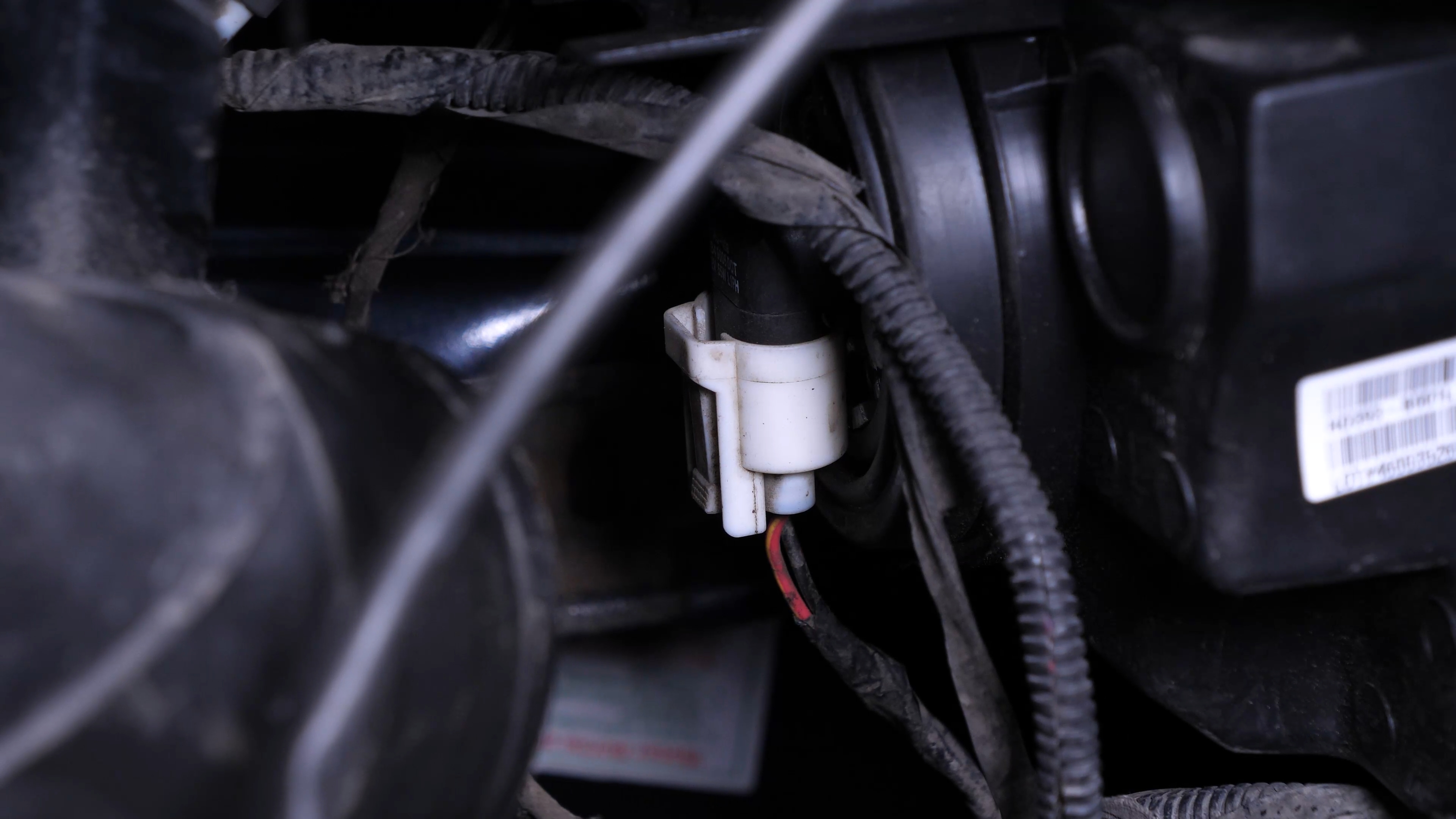 Replace the low beam bulb