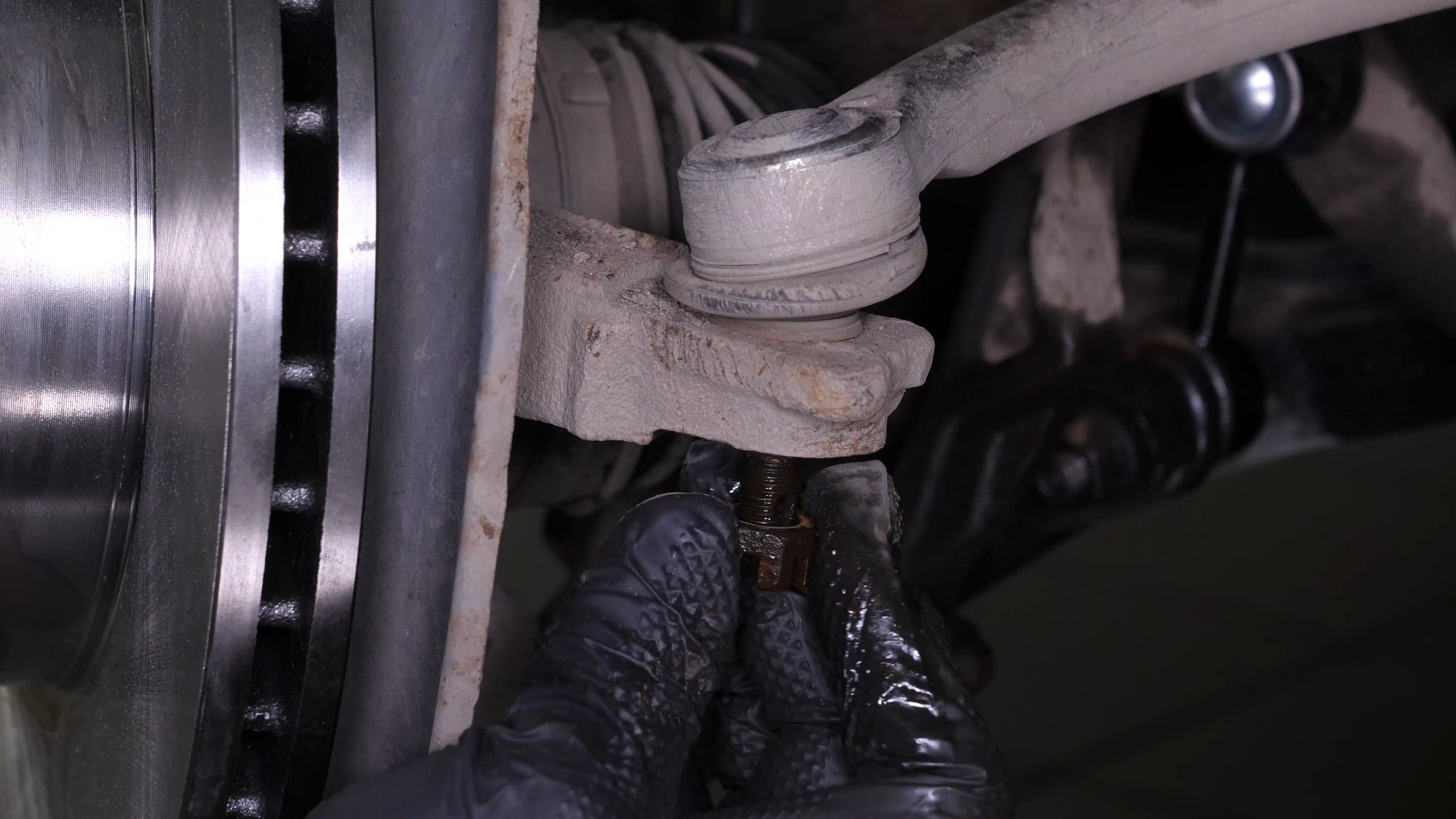 Loosen the holding nut