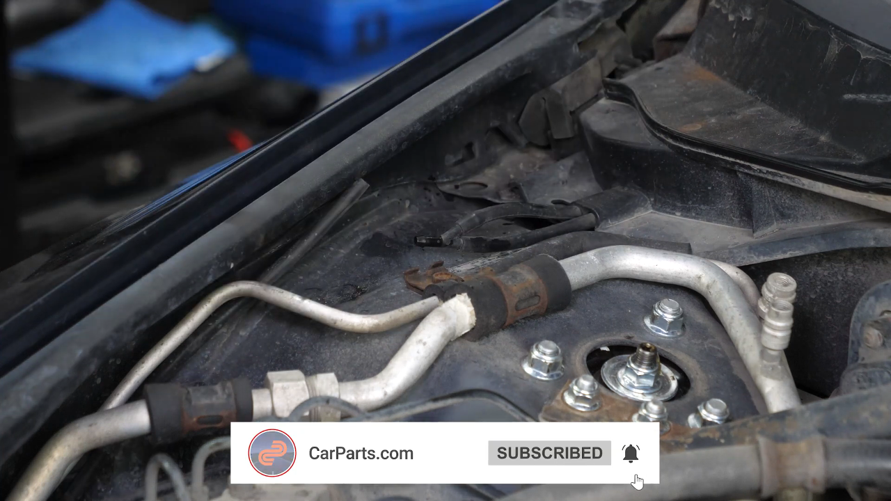 Disconnect the washer pump fluid hose.