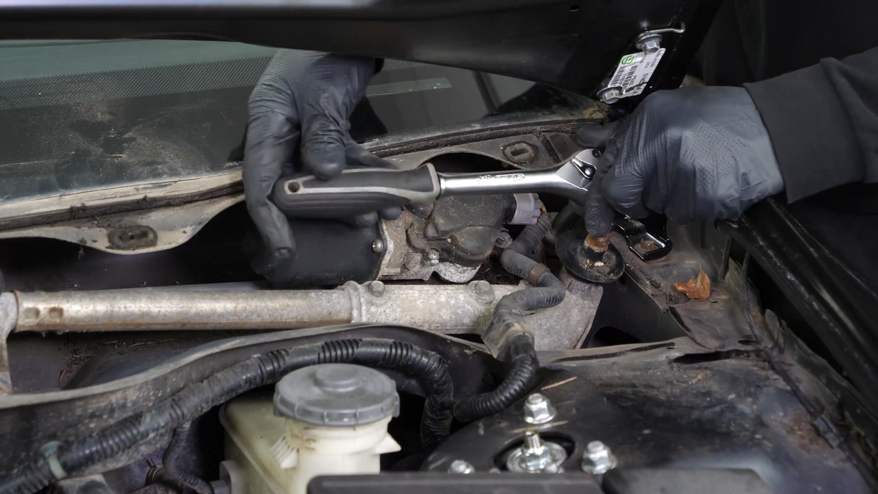 Remove the wiper motor assembly