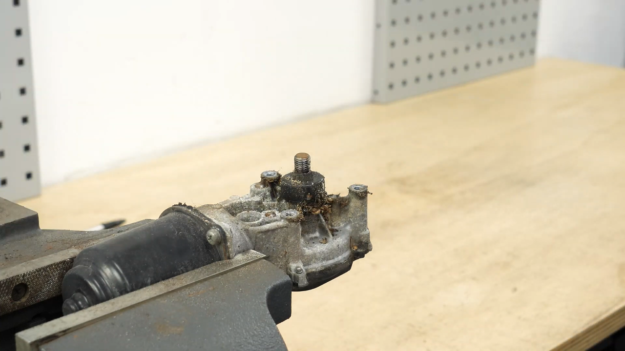 Remove the wiper motor