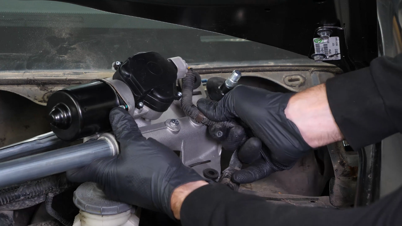 Put the wiper motor back