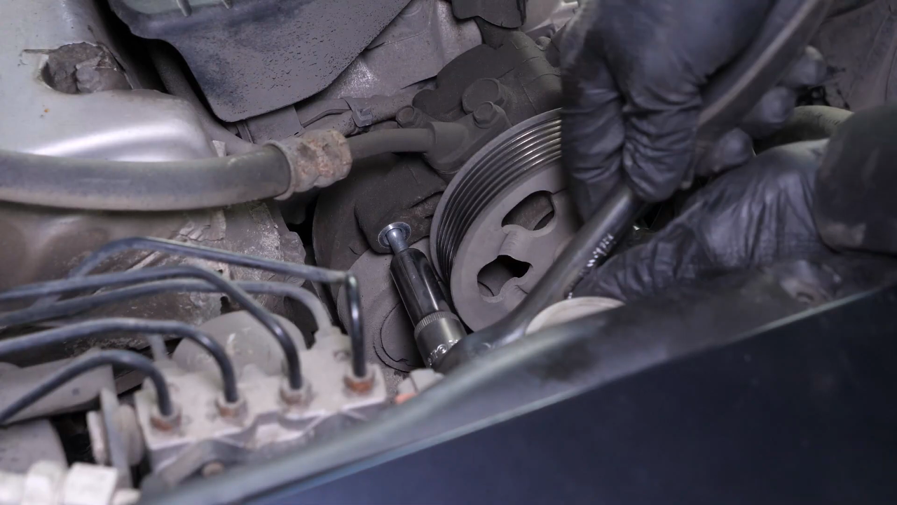 Remove the tensioner pulley