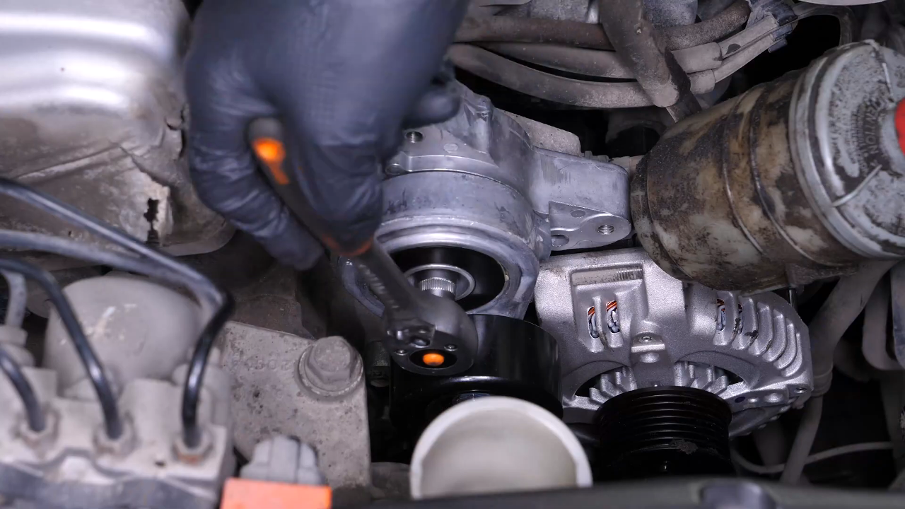 Install the new tensioner pulley