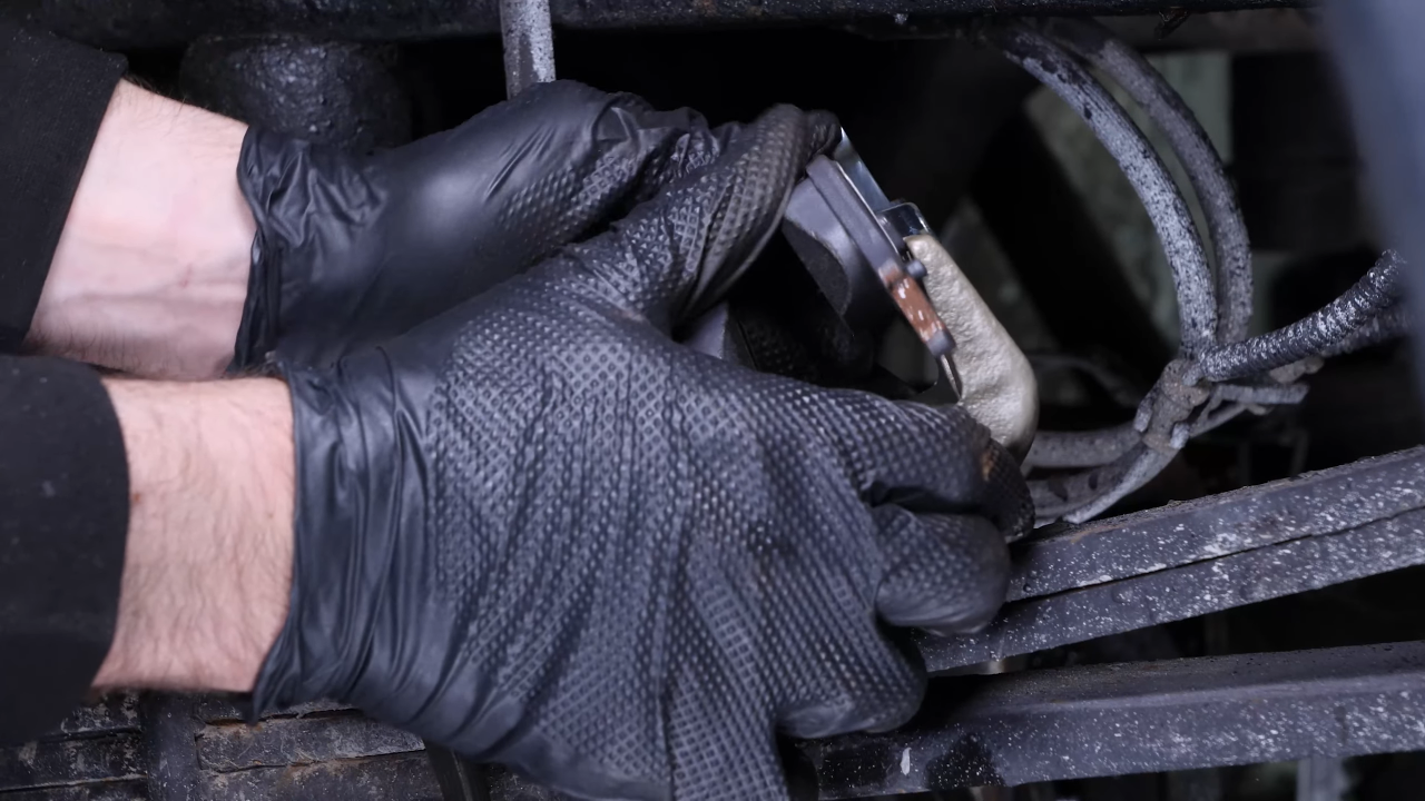 Remove the rear brake system