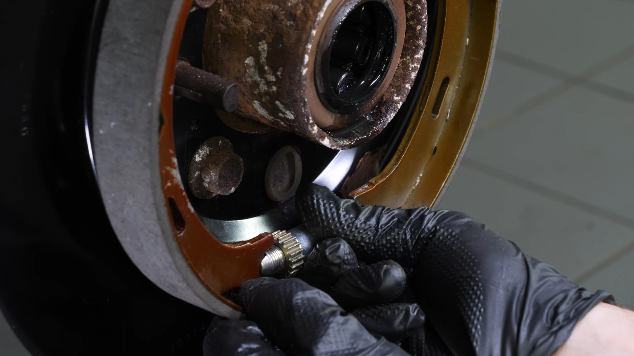 Remove the parking brake shoes