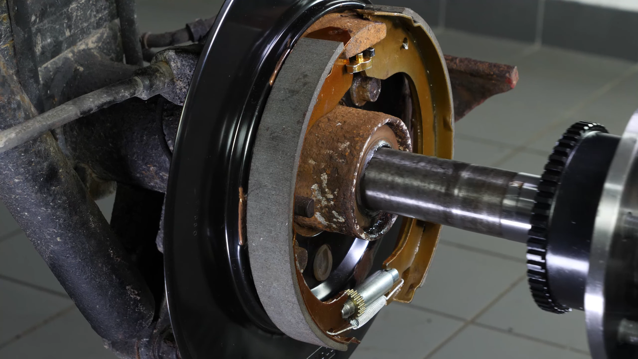 Put the rear axle shaft back in place