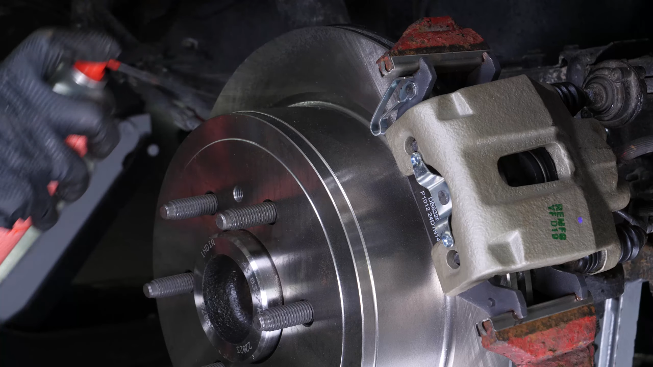 Put the rear brake system back