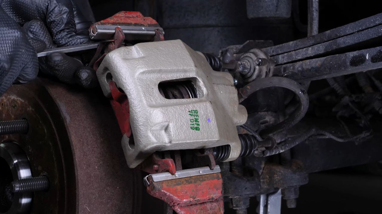 Remove the rear brake system