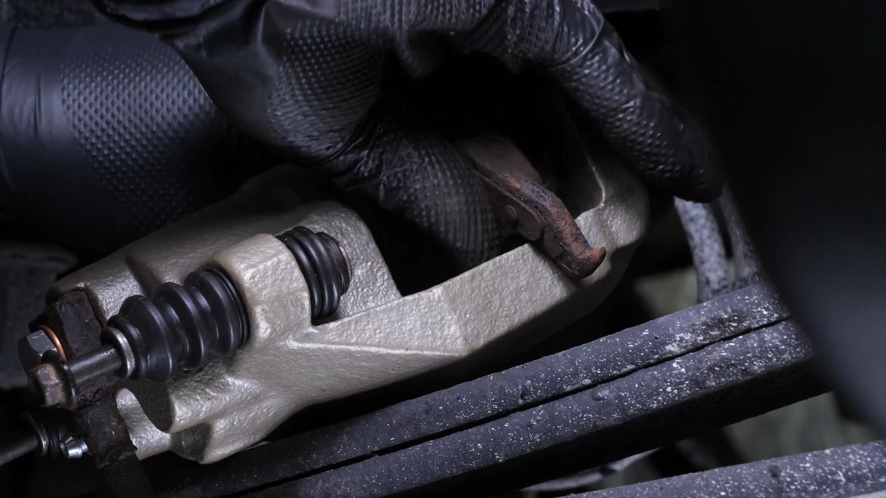 Remove the rear brake system