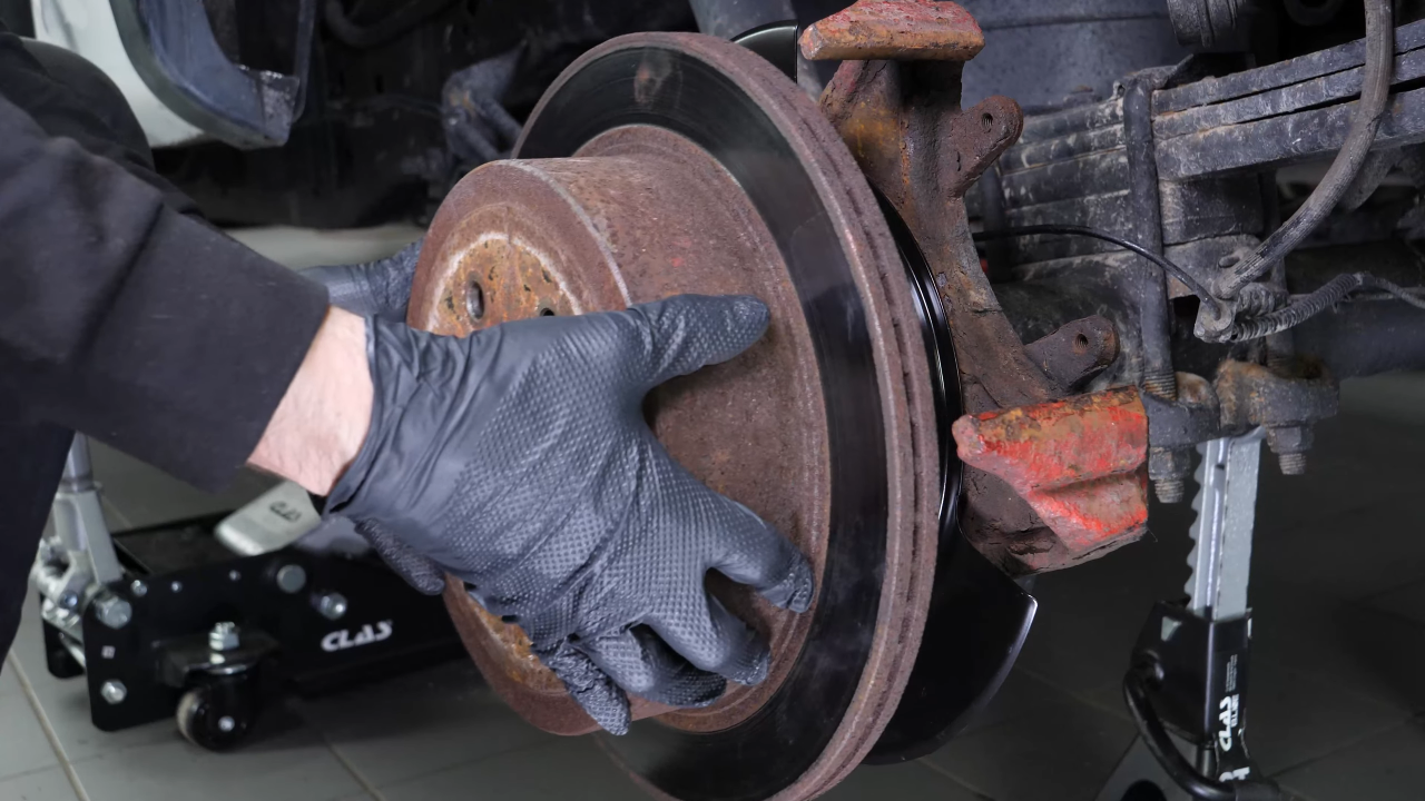 Remove the rear brake system