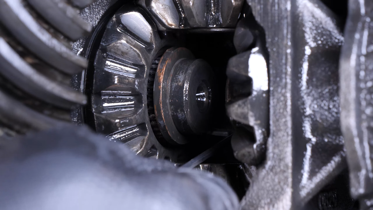 Disengage the rear axle shaft from the differential